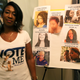 Marissa Alexander standing in her Jacksonville, Fla., home next to a board of women who were victims of domestic abuse, on October 24, 2018.